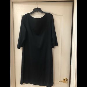 Saint John black dress with minimal designs onside